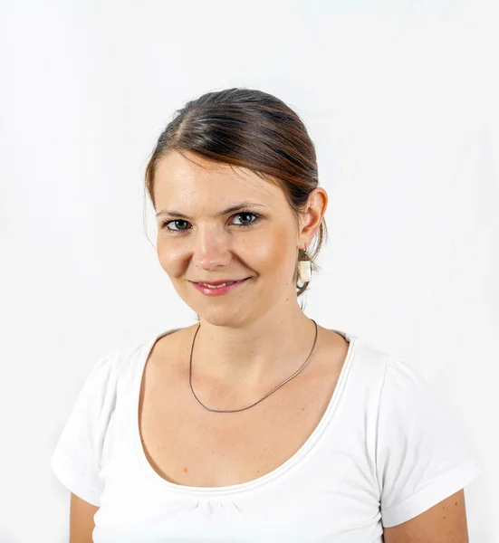 Portrait of a beautiful young woman on light background — Stock Photo, Image