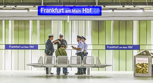 Railway police checks a passenger for a valid ticket — Stock Photo, Image