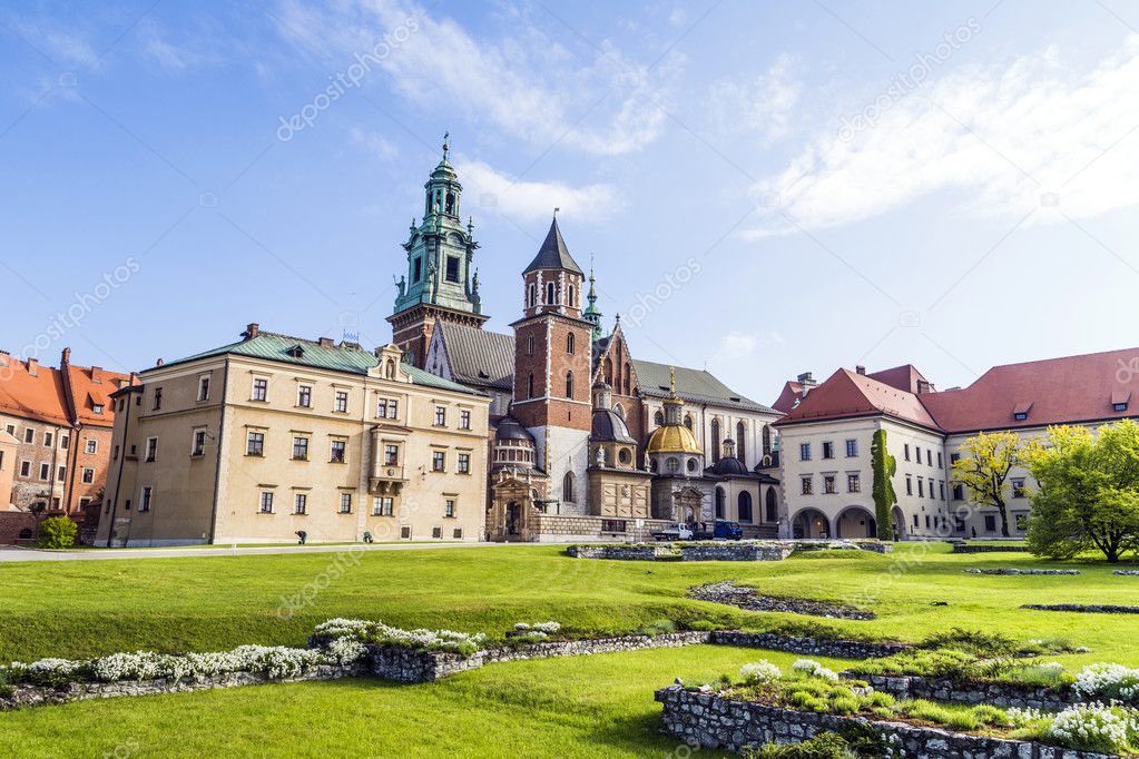 Wawel castle on sunny day with blue sky and white clouds