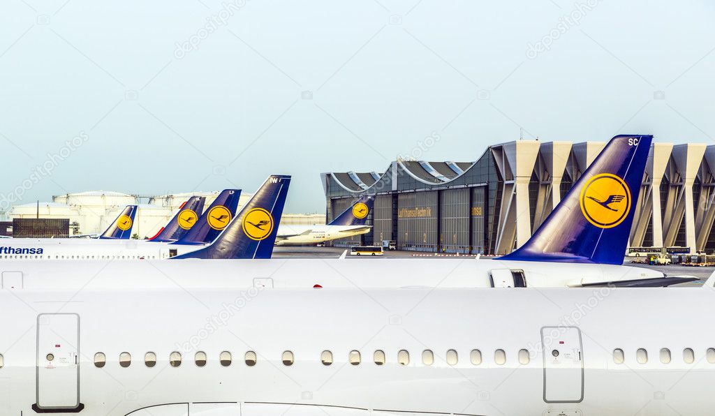 FRANKFURT, GERMANY - MAY 22, 2014: Lufthansa Aircrafts standing at the terminal 1 at Frankfurt airport. Frankfurt is one of the busiest airport in Europe and Number one in Germany.