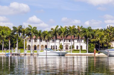 luxury houses at the canal in Miami clipart