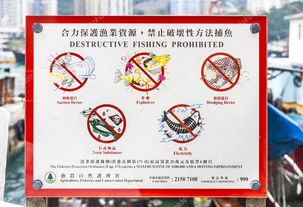 sign forbids using of dynamite and other techniques for fishing