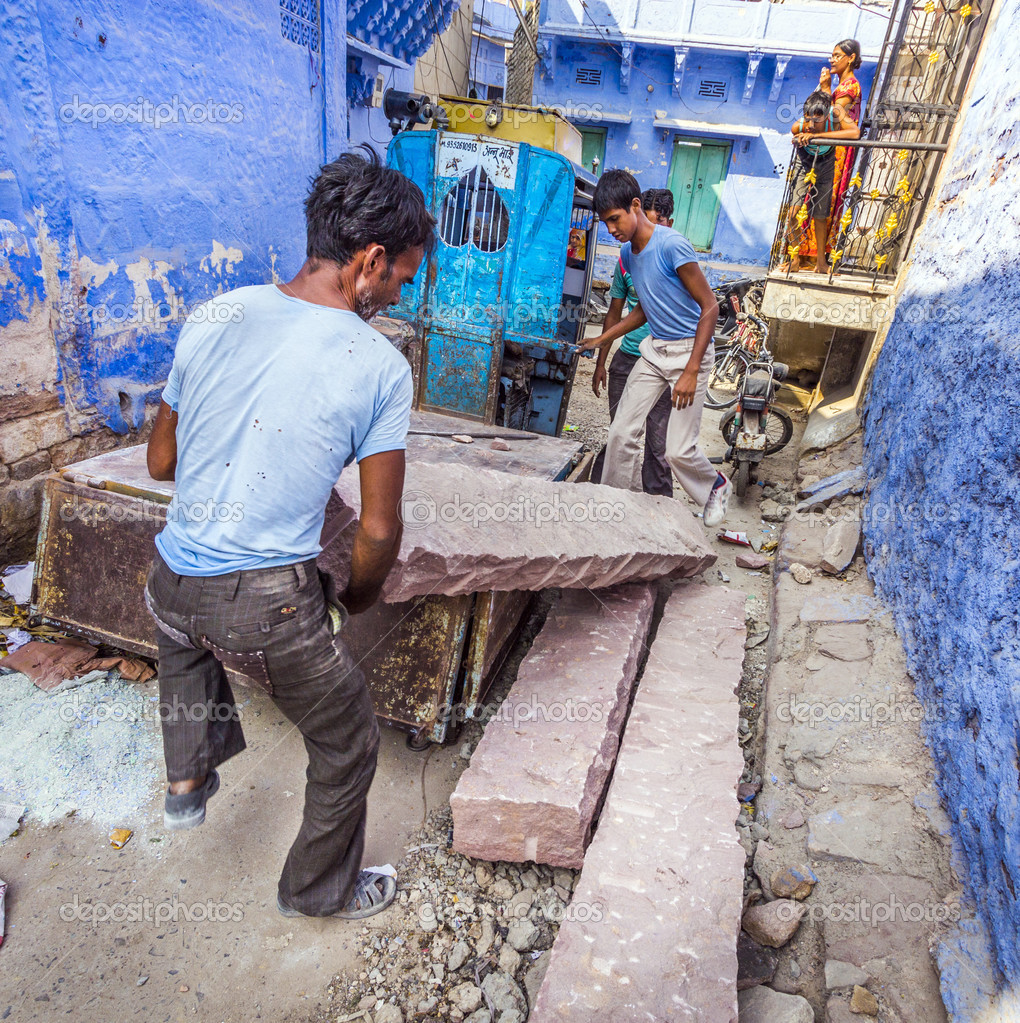 Indian worker carrying stones Stock Editorial Photo © Hackman 47518383