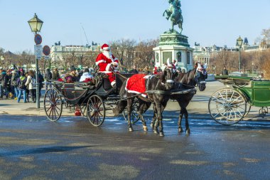 driver of the fiaker is dressed as Santa Claus in red clipart