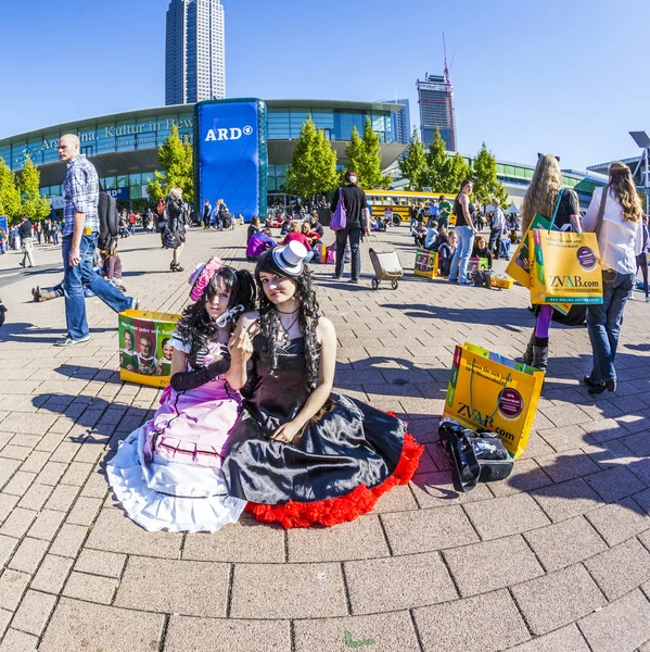 Public day at Frankfurt international Book Fair, colorful people made up as Manga from the Comic scene with costumes have a big party — Stock Photo, Image
