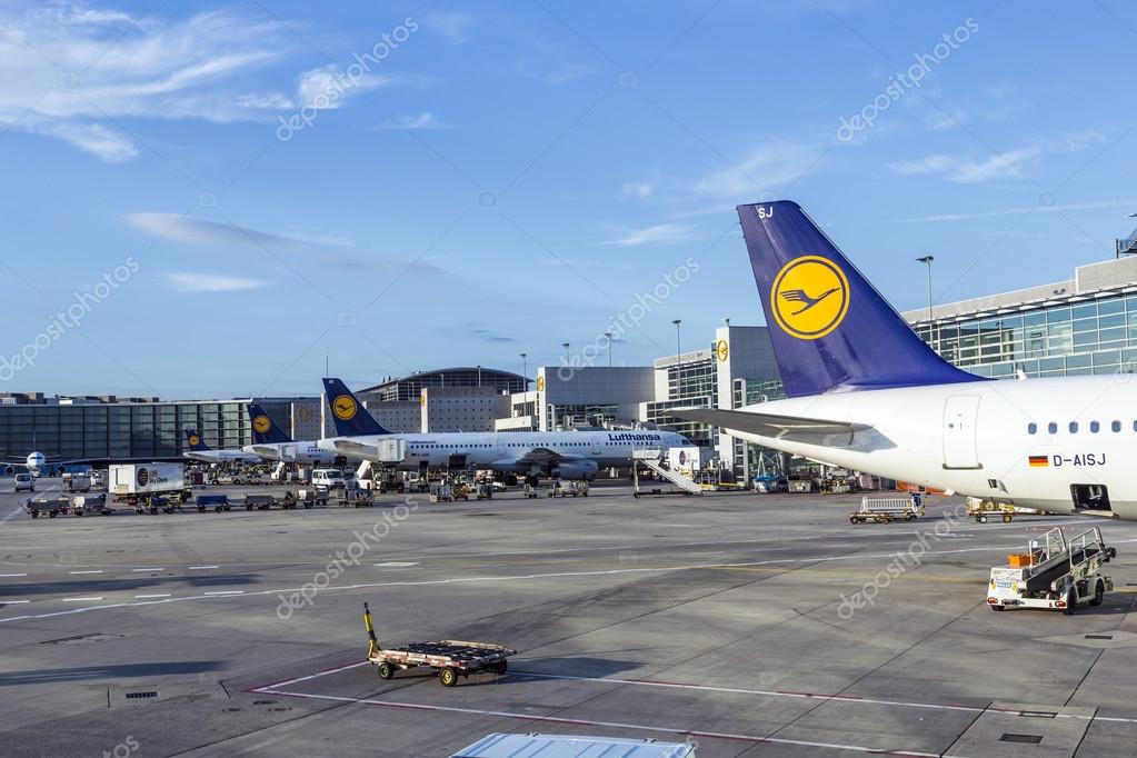 FRANKFURT, GERMANY - JUNE 13, 2014: Lufthansa Aircrafts standing at the terminal 1 at Frankfurt airport. Frankfurt is one of the busiest airport in Europe and Number one in Germany.