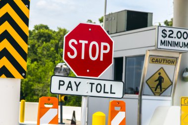 Toll Road sign at a toll bridge in Texas clipart