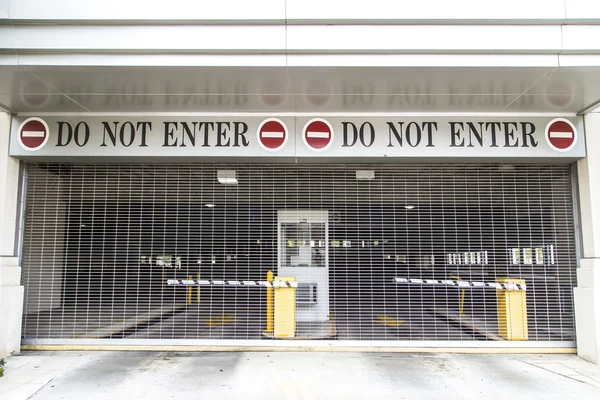 Do not enter sign with closed roller blind at a garage — Stock Photo, Image