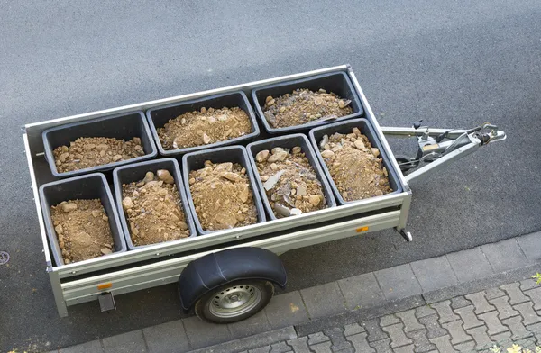 Construction rubble in a mixung pond on a trailer — Stock Photo, Image