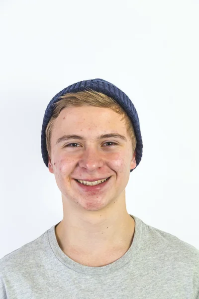 Portrait of a happy smiling boy with cap — Stock Photo, Image