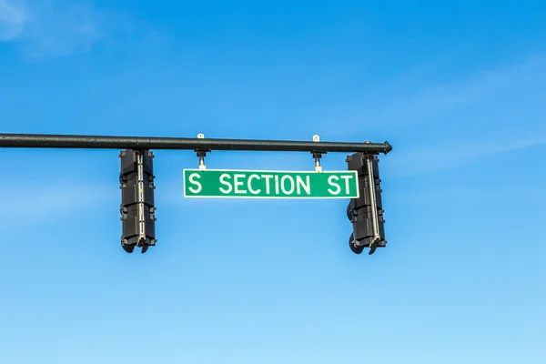 Traffic lights in mobile with street name — Stock Photo, Image