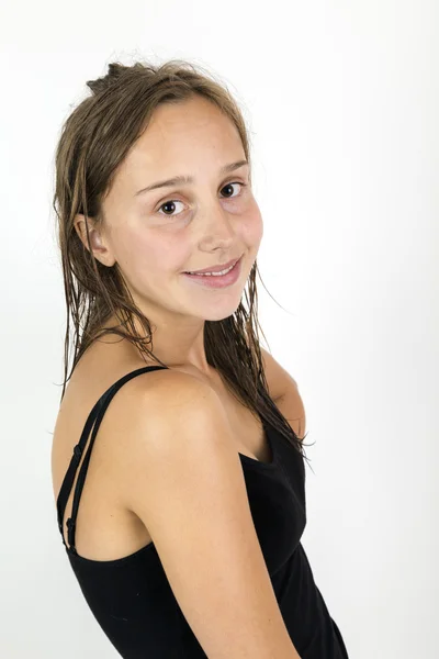 Attractive teenage girl with long brown hair — Stock Photo, Image