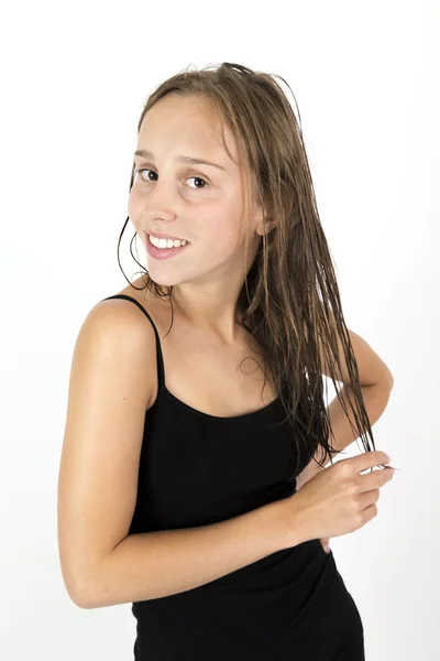 Attractive teenage girl with long brown hair — Stock Photo, Image