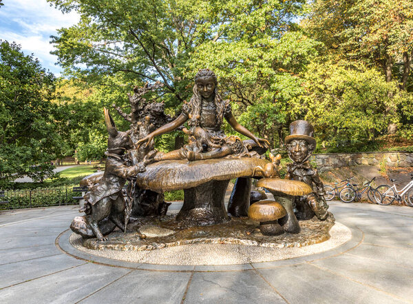 NEW YORK, USA - OCT 6, 2017: Central Park Alice in Wonderland Sculpture. It is a fafourite spot for climbing.