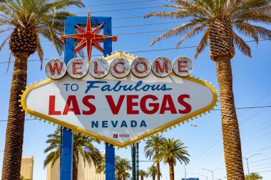 Las Vegas, USA - May 23, 2022:   Las people enjoy the famous Welcome To Las Vegas sign at the entrance to Las Vegas, Nevada.