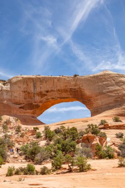 Wilson Arch in a semi desert landscape in Moab Utah, USA