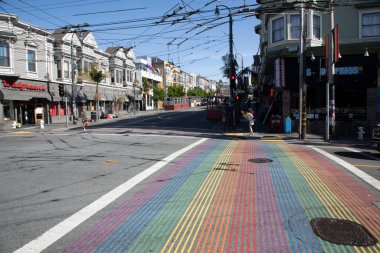 San Francisco, USA - May 18, 2022: street view at Castro street with bus overhead electricity lines in San Francisco, California CA, USA.