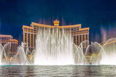 Las Vegas, Nevada, USA -May 23, 2022 : The Fountains of Bellagio at night. This feature performs choreography with water, music and light in front of the Bellagio hotel and casino.