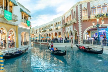 Las Vegas, USA - May 24, 2022: view to hotels and casinos at the Strip in daytime with neon advertising.