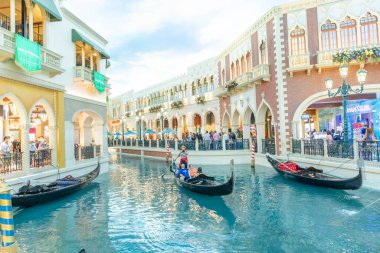 Las Vegas, USA - May 24, 2022: view to hotels and casinos at the Strip in daytime with neon advertising.