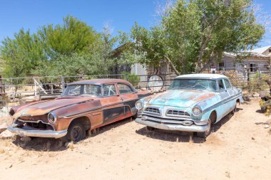 Hackberry, USA - May 25, 2022: old rusty vintage cars in Hackberry , Arizona, USA. Hackberry General Store is a popular museum of old Route 66.