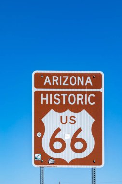 Arizona Route 66 sign under blue sky