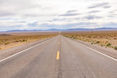 Riding the Route 95 in Nevada on daytime thru the desert, USA