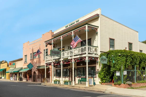 Jamestown, USA - June 3, 2022: old historic building Carboni from 1859 with typical 2 storage  architecture  and wooden facade with balcony in Jamestown, California.
