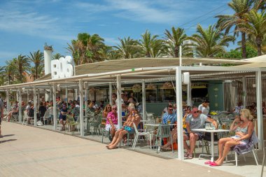 Palma de Mallorca, Spain - June 22, 2022: beach at gate 6 with promenade in Palma de Mallorca, called in German Ballermann - engl. Funman.