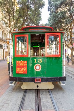 San Francisco, USA - May 20, 2022: historic  Cable Car Powell Hyde Line on turntable at Powell Street terminal at Market Street in downtown San Francisco, California CA, USA.