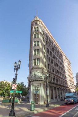 Oakland, USA - May 19, 2022: old historic flatiron building called Lionel Wilson in Oakland.