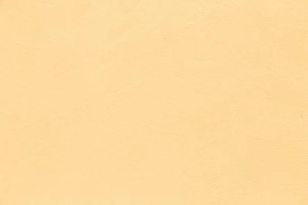 オレンジ塗装石膏壁の調和のとれた背景 — ストック写真