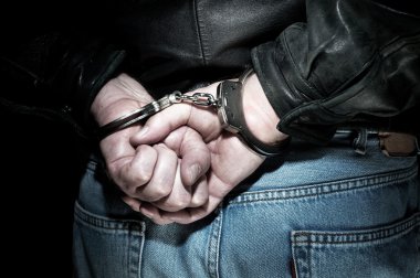 Man in handcuffs clipart