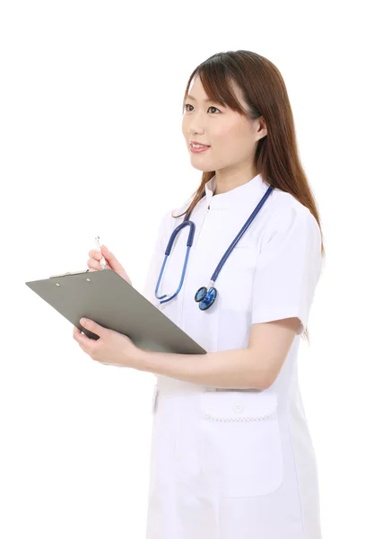 Junge asiatische Krankenschwester — Stockfoto