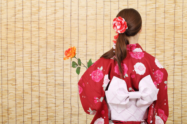 Back view of young asian woman