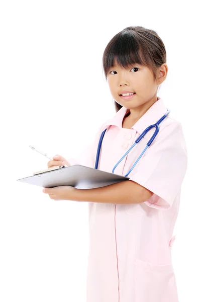 Kleine asiatische Mädchen in Uniform — Stockfoto