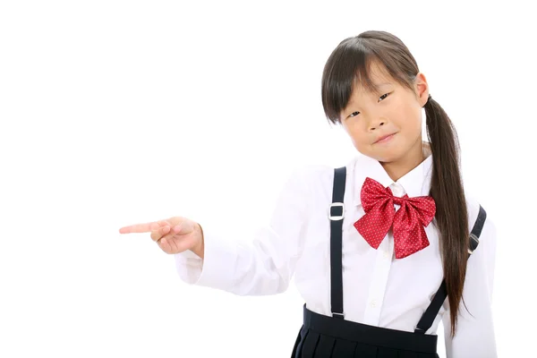 Smiling little asian schoolgirl Stock Image