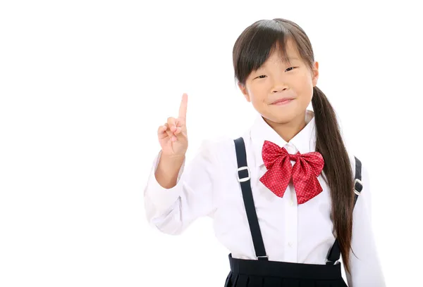 Smiling little asian schoolgirl Stock Photo