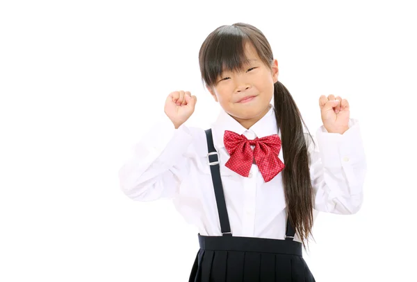 Улыбающаяся маленькая азиатская школьница Лицензионные Стоковые Изображения
