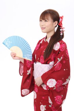 Young asian woman in kimono clipart