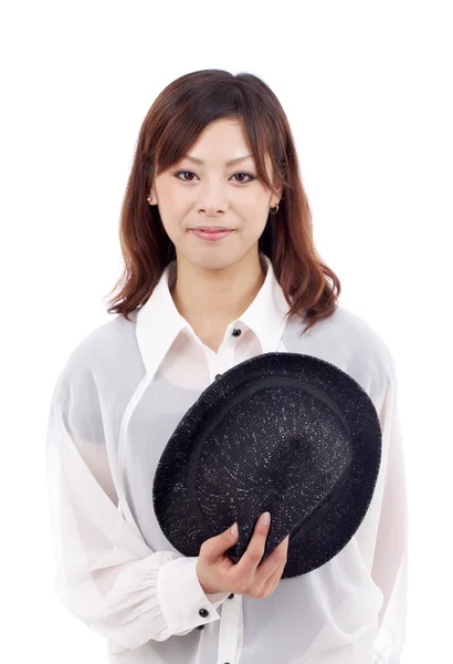 Young asian girl holding hat — Stock Photo, Image