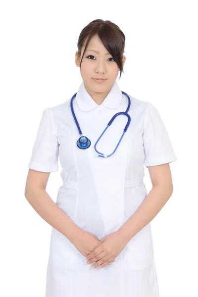 若いアジアの女性看護師の手で渡った — ストック写真