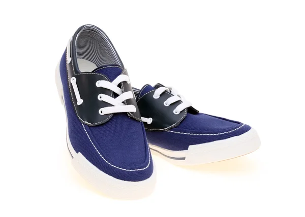Walking blue sneakers — Stock Photo, Image