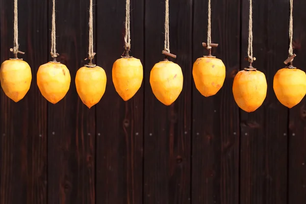 Drying persimmon by the sun — Stock Photo, Image