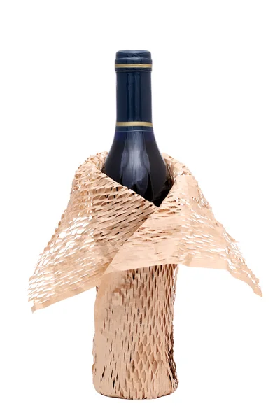 Wine bottle with wrapping paper — Stock Photo, Image