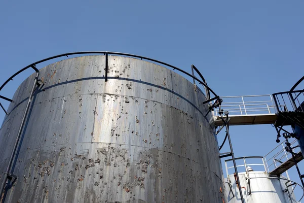 Old black storage tank — Stock Photo, Image