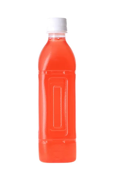 Rood sap in een fles — Stockfoto