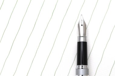 Japonca mektup kağıdı arkaplanı olan dolmakalem.