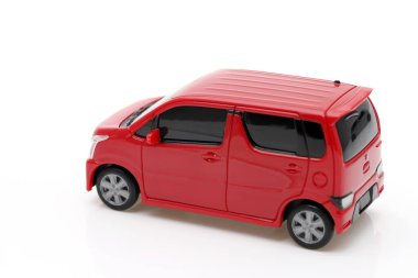 small toy car with red colors isolated on white background