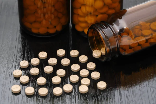 Medical Pills Brown Glass Bottle Black Wooden Table — Fotografia de Stock